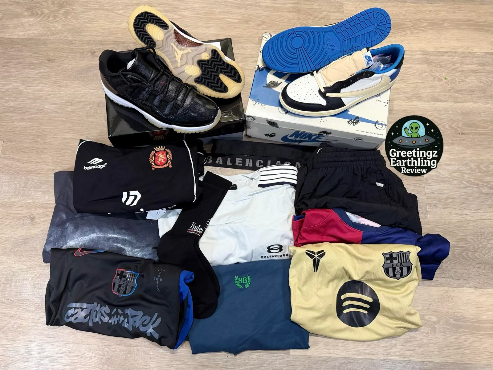 Sneakers, shirts and shorts laid out after unpacking
